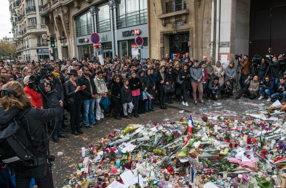  Public show their respects for victims shortly after attack