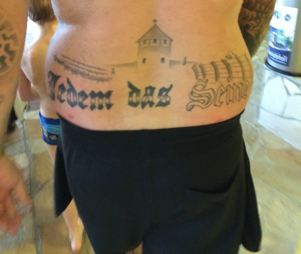  The tattoo shows a silhouette of the notorious death camp where more than one million Jews were murdered