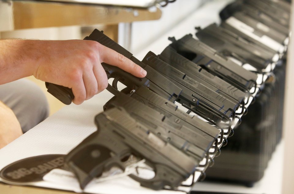  A row of handguns pictured at gun store in Utah