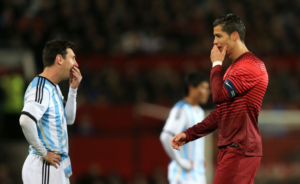 FILE PHOTO: Lionel Messi says his Argentina career is over after Copa America final defeat Argentina's Lionel Messi (left) and Portugal's Cristiano Ronaldo (right) chat during the match ... Soccer - International Friendly - Argentina v Portugal - Old Trafford ... 18-11-2014 ... Manchester ... United Kingdom ... Photo credit should read: Mike Egerton/EMPICS Sport. Unique Reference No. 21505100 ...