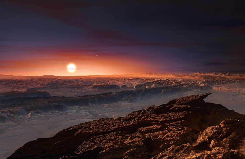  An artist's impression of a view of the surface of the planet Proxima b orbiting the red dwarf star Proxima Centauri, the closest star to our solar system