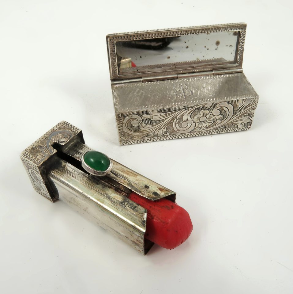  Monogrammed lipstick ... Braun's bright red lipstick, also up for sale, has been left untouched for over 70 years