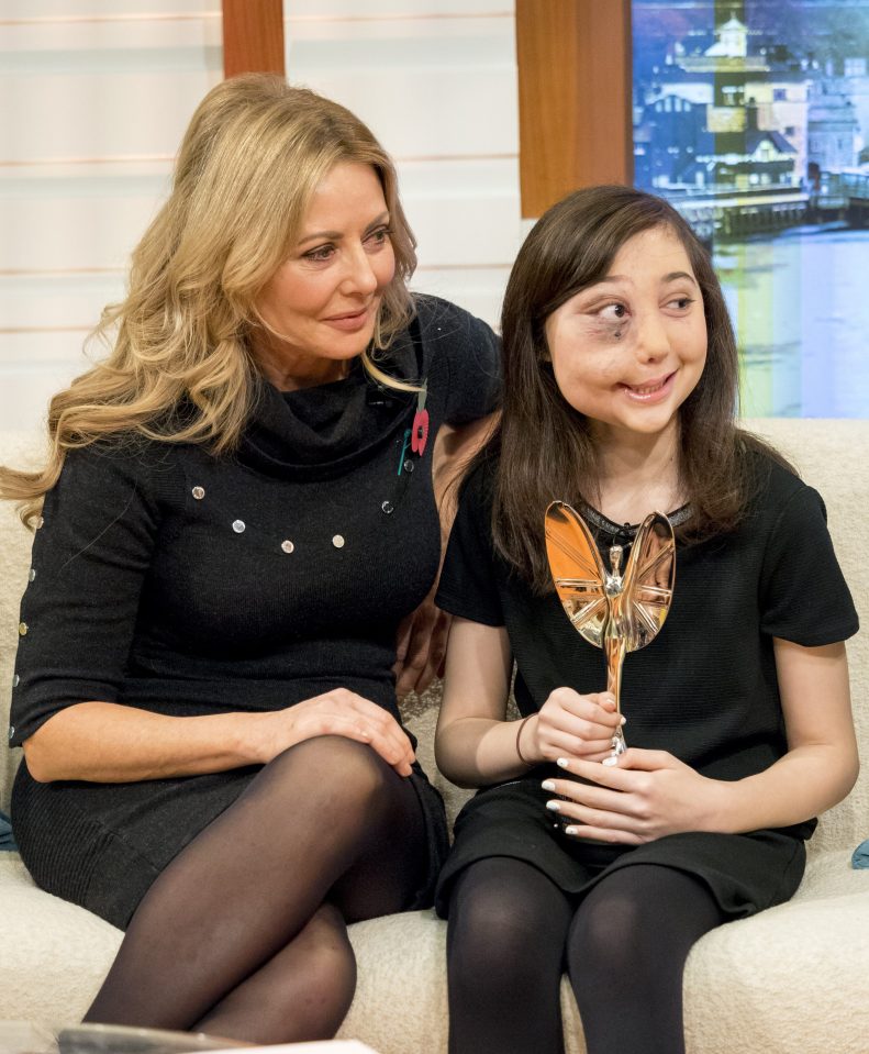  Carol's companion Nikki, 12, was presented the Child of Courage award the night before, which she clutched with pride throughout the interview