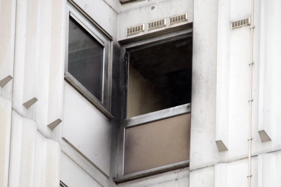  Burnt-out window of the couple's flat