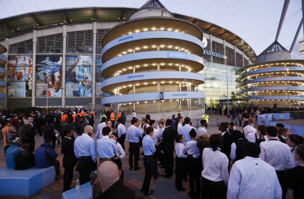 Fans and staff were forced to stand outside the stadium as alarms were sounded