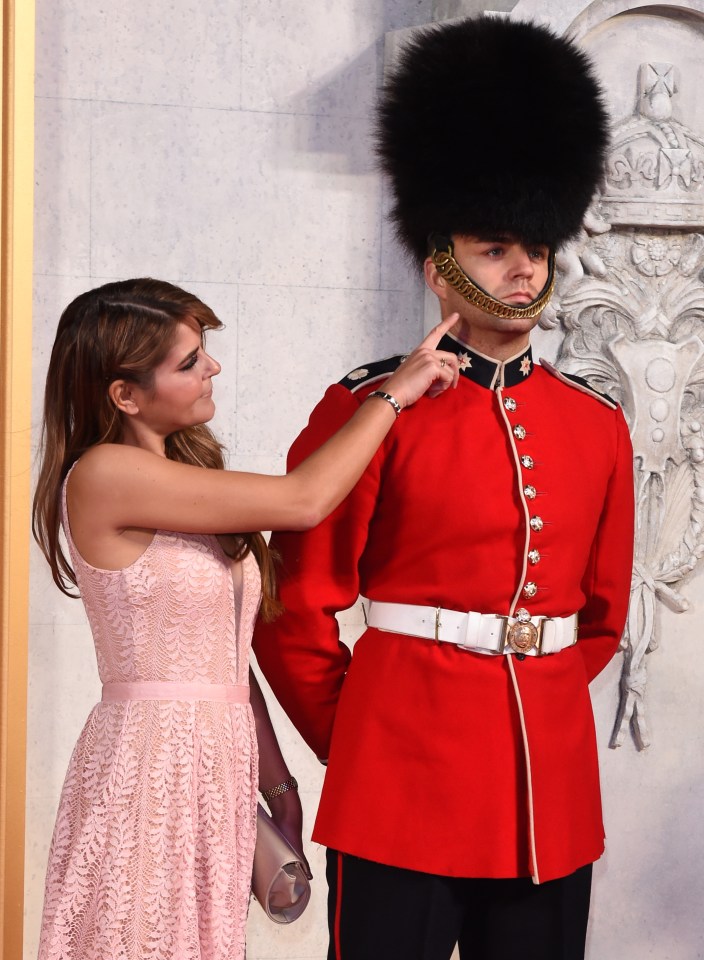  She then had a little fun with one of the royal guards