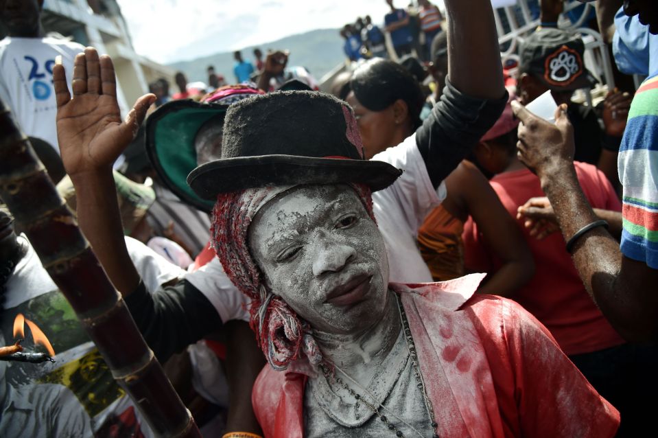  Followers meet in a sprawling cemetery in the capital of Port-au-Prince to remember the dead