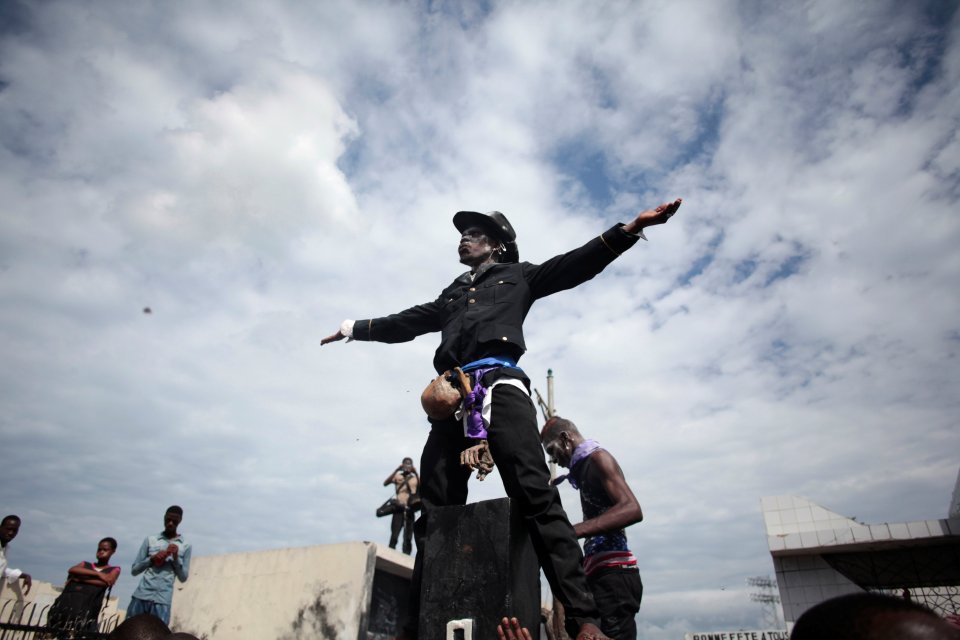  A spiritual believer is dressed in clothes similar those it is believed Baron Samedi wears