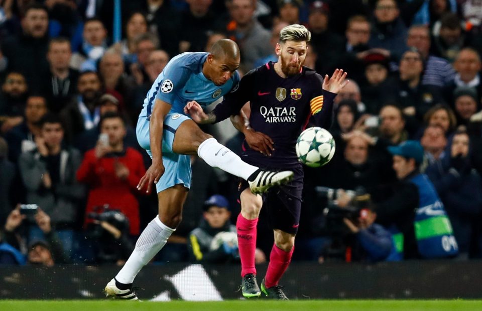  Fernandinho battles with Lionel Messi at Etihad - but denies clashing with him after the City victory