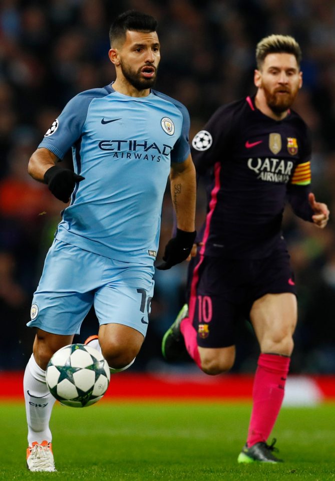  Sergio Aguero and Lionel Messi in the thick of the battle