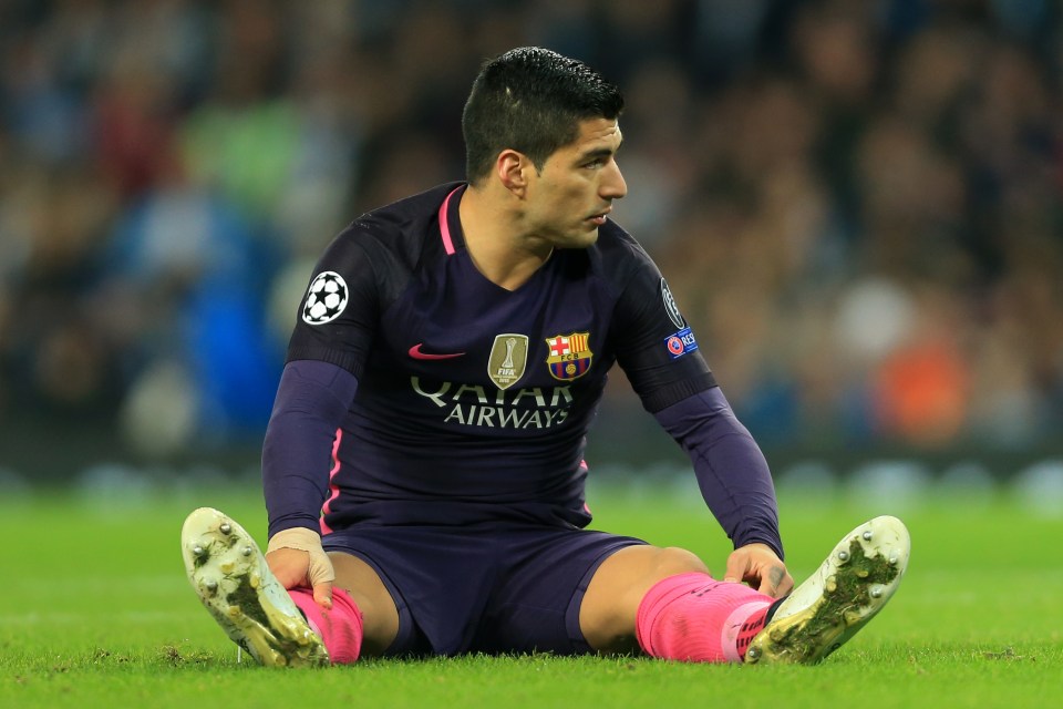  Luis Suarez ponders defeat against Manchester City