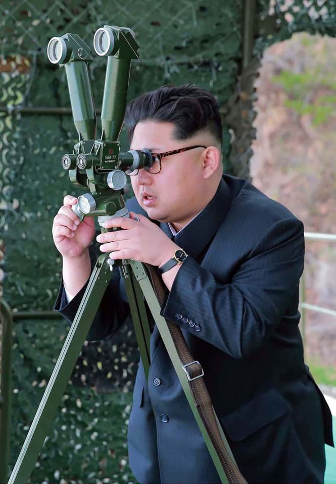  Kim inspecting an underwater test-fire of a strategic submarine ballistic missile