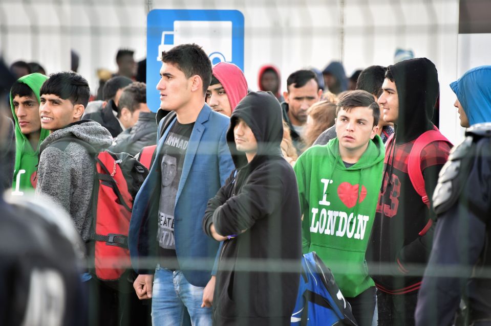  Young migrants from Jungle, including one with 'I love London' hoodie