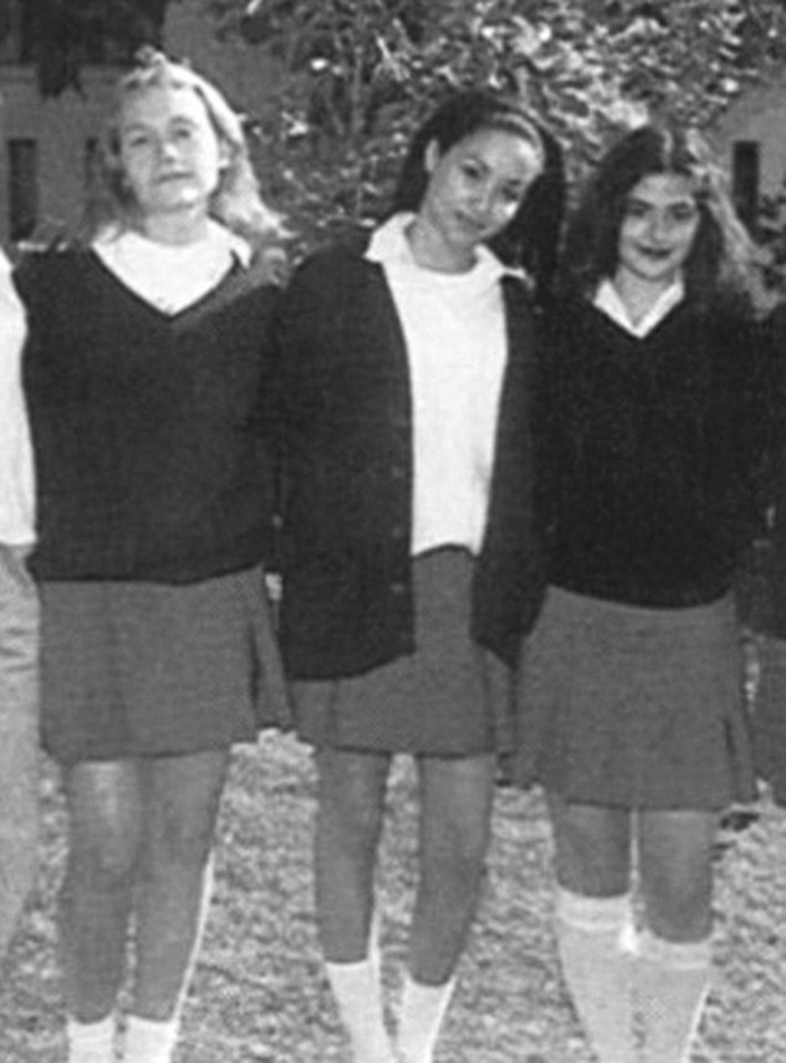  Young Meghan, centre, with school pals