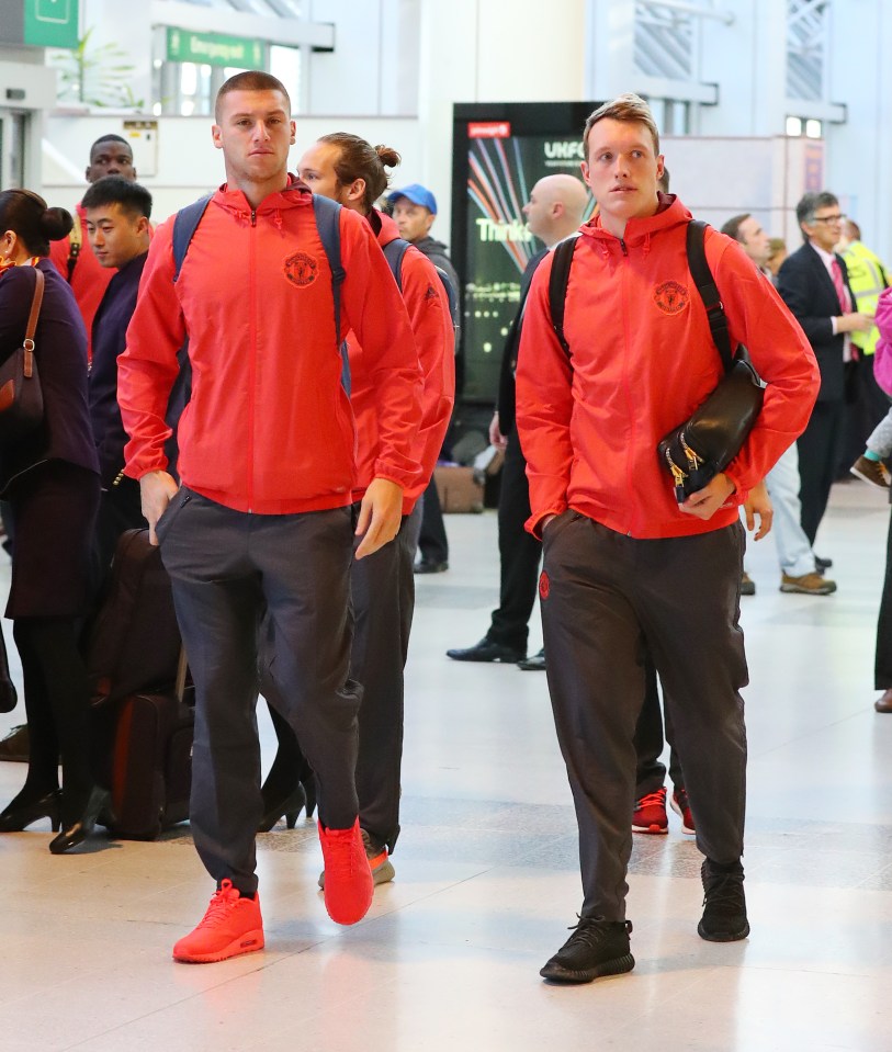  Phil Jones (right) and his Manchester United team-mates flew out to Turkey on Wednesday for their Europa League clash