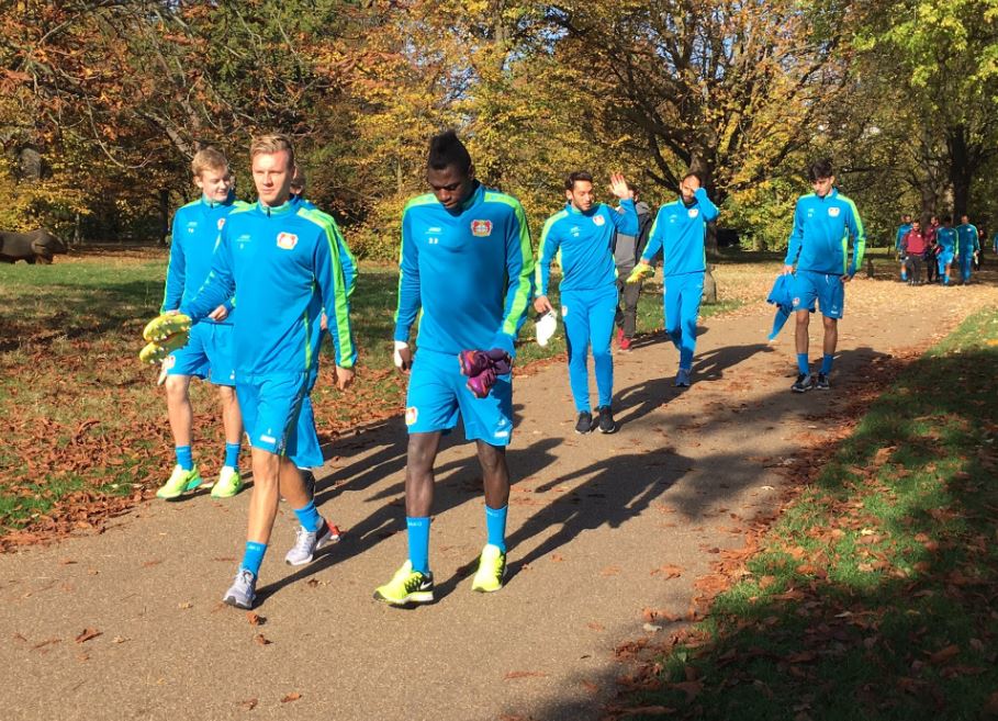  Bayer Leverkusen players carry their boots before warming-up in Regent's Park