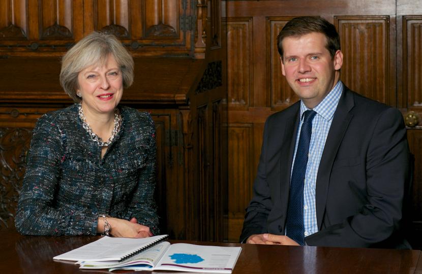  Proud . . . Howlett, elected last year, with PM Theresa May