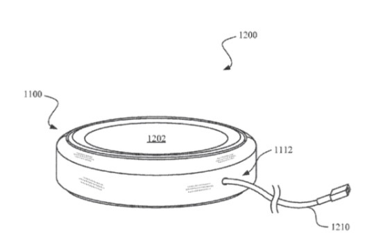  This patent appears to show a wireless charging plate, which will charge the phone up when it's placed on top