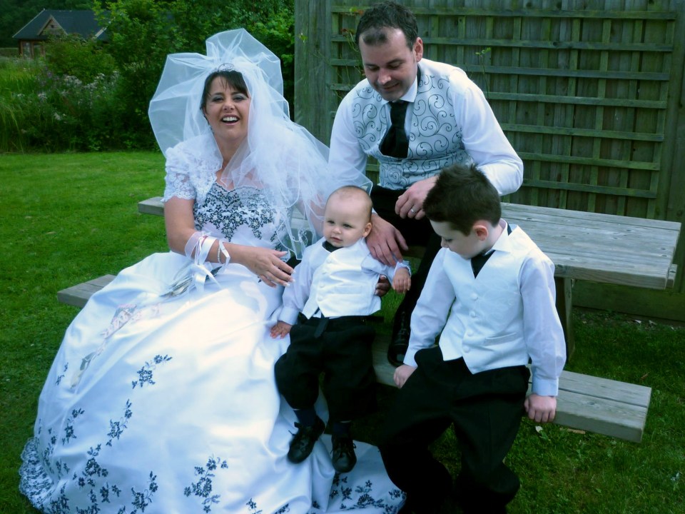  Sally and David Stokes with their children Matthew and Adam on their wedding day