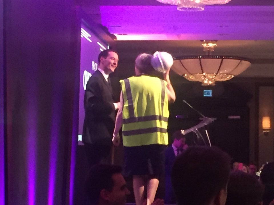  The Prime Minister took her hat off to Osborne as she approached him on the stage