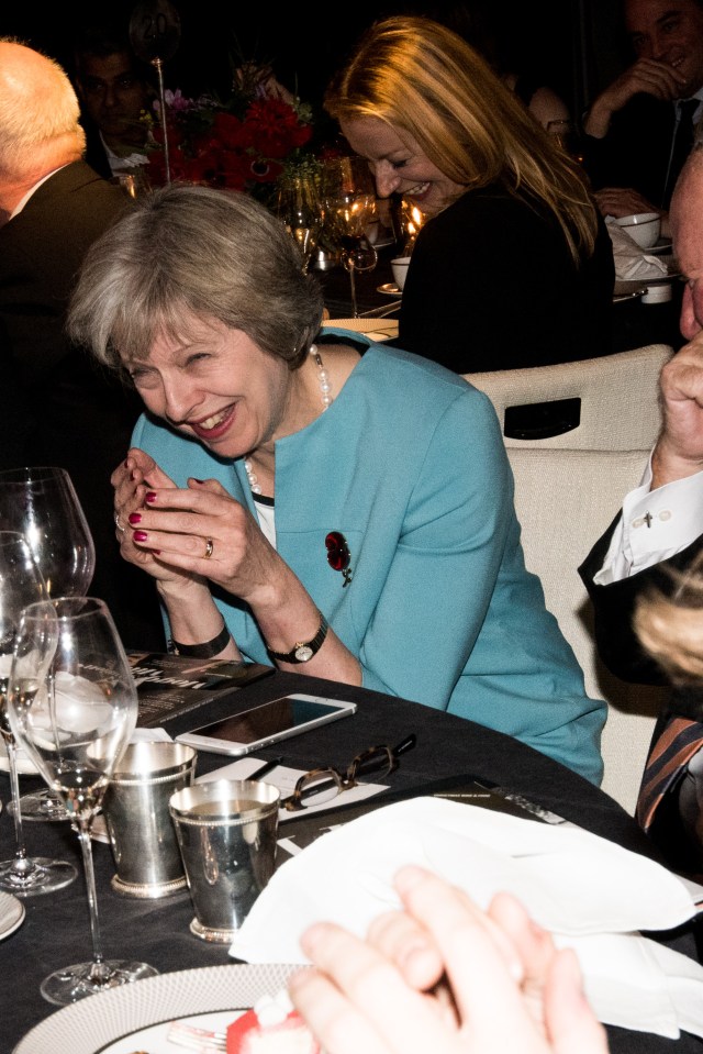  May pictured in a fits of laughter as Boris Johnson spoke at the awards ceremony