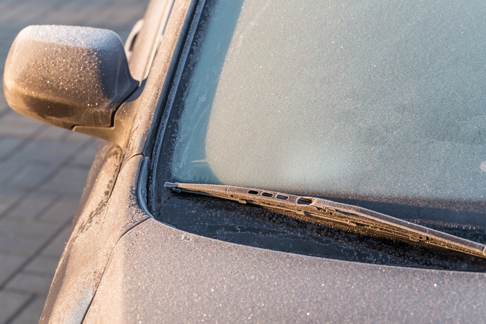  Prevention is better than cure - you can put a soaked towel or a cover over the window to prevent it from icing up