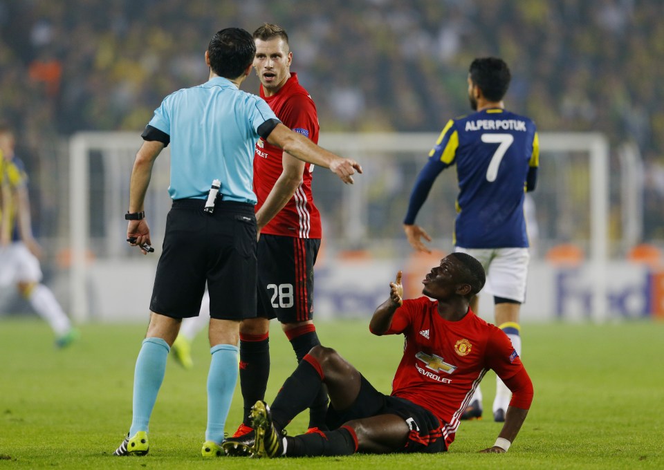  Paul Pogba went down after a challenge with Josef de Souza