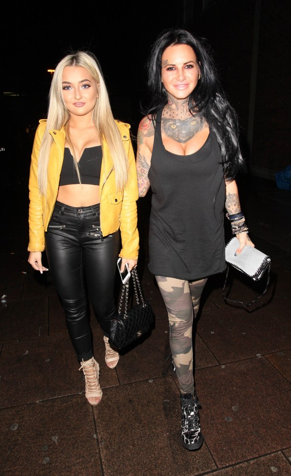  Lacey wore a revealing crop top and black leather jeans teamed with a vibrant yellow jacket