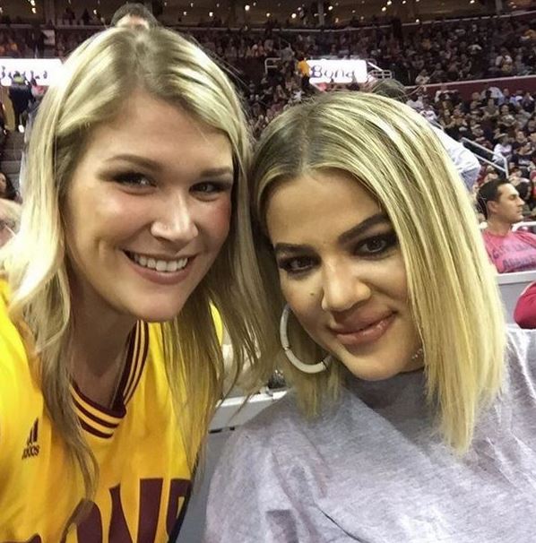 The picture was taken as she posed up with a fan at the basketball 