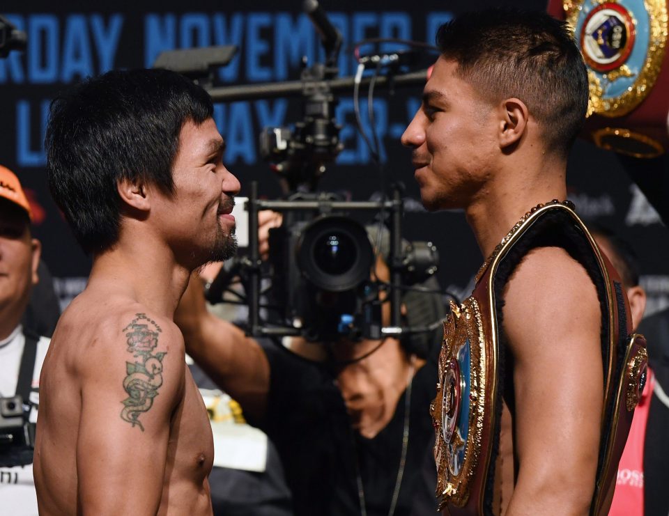  Manny Pacquiao broke into a smile during his head to head against Jesse Vargas after they weighed in