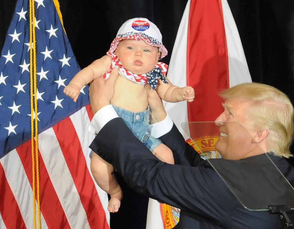  Baby gets in on the act with Trump in Tampa, Florida, today