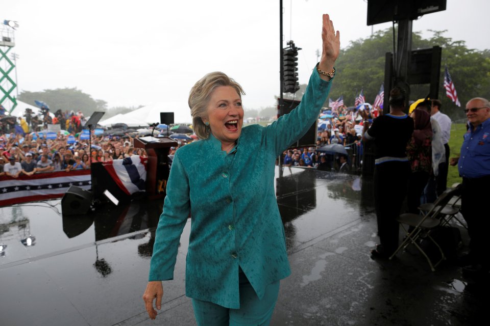  Hillary Clinton waves to supporters in a rainy Pembroke Pines, Florida, today