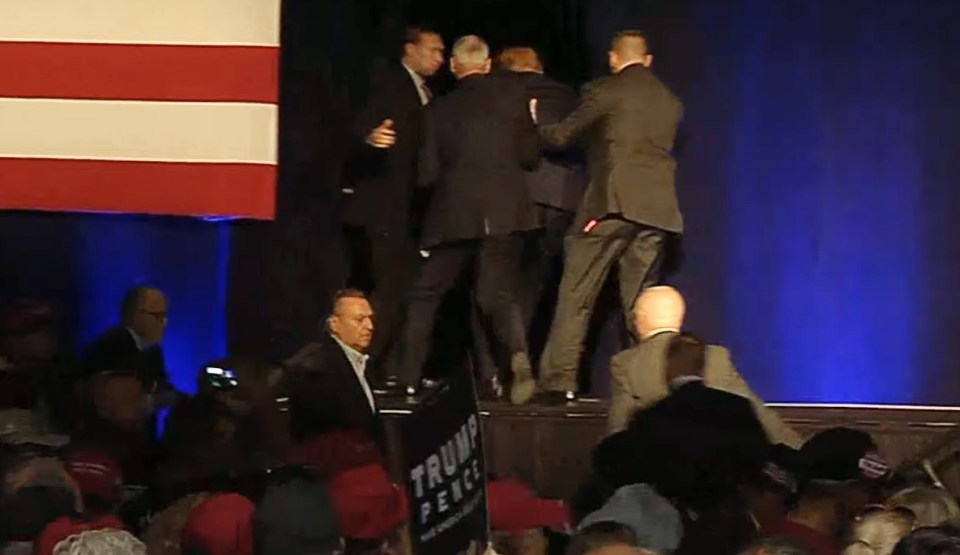  Donald Trump was hustled off stage by his security last night after a gun alert