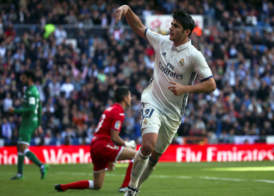  Alvaro Morata reels away in celebration after scoring Real Madrid's third goal