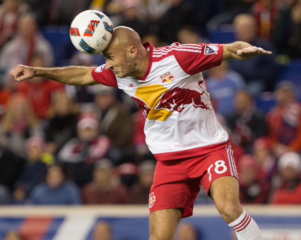  New York Red Bulls defender Aurelien Collin heads the ball against the Montreal Impact