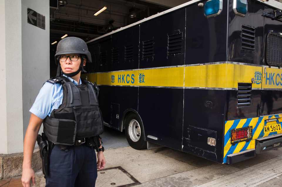  A prison van carrying alleged double murderer Rurik Jutting arrives at the High Court in Hong Kong today