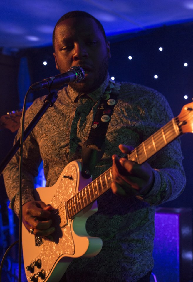  Sinclair playing his old custom white Fender Telecaster guitar