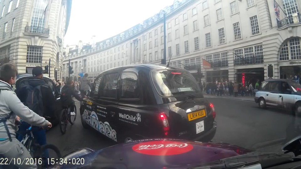  They narrowly avoid cars as they weave through oncoming traffic