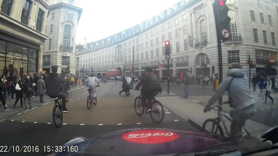  They were popping wheelies as they cycled through a red light