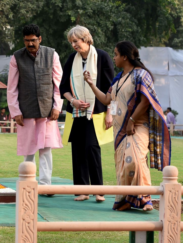  She looks on as officials explain the significance of the memorial during her visit to Gandhi Smriti, a museum dedicated to Mahatma Gandhi in New Delhi