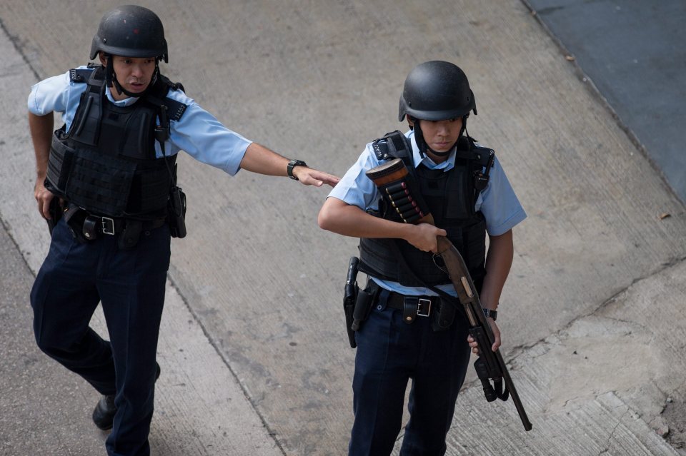  Armed officers stood guard outside court before Jutting was taken in and sentenced after a lengthy address by the judge