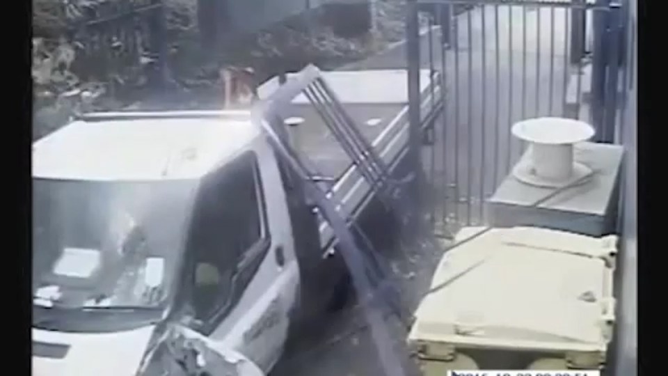  CCTV shows the Network Rail vehicle crashing through the gate of the compound