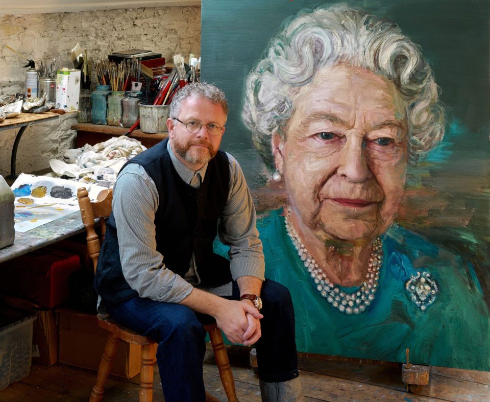  Artist Colin Davidson, who has painted the likes of Angela Merkel and Brad Pitt, poses with his portrait of the Queen