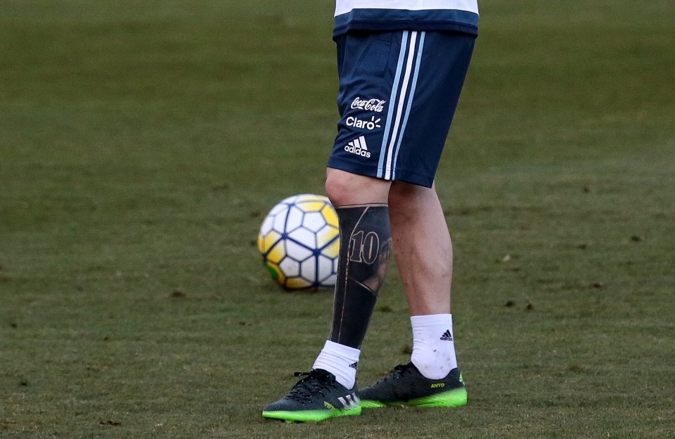  ...And how Lionel Messi's left leg artwork looks following his latest inking