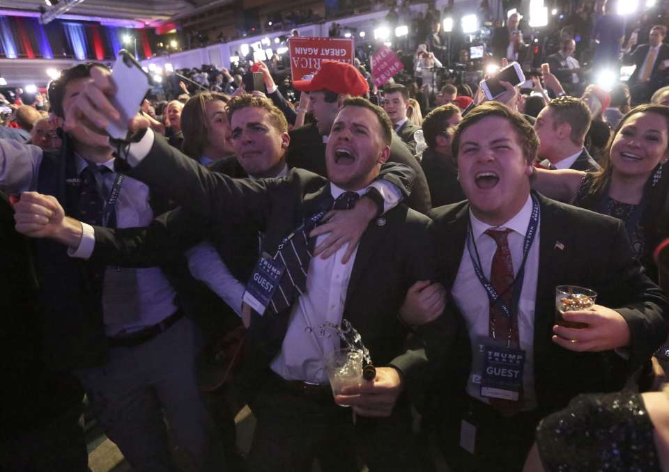  Trump supporters at his election night rally in Manhattan as news of barnstorming election performance filtered through