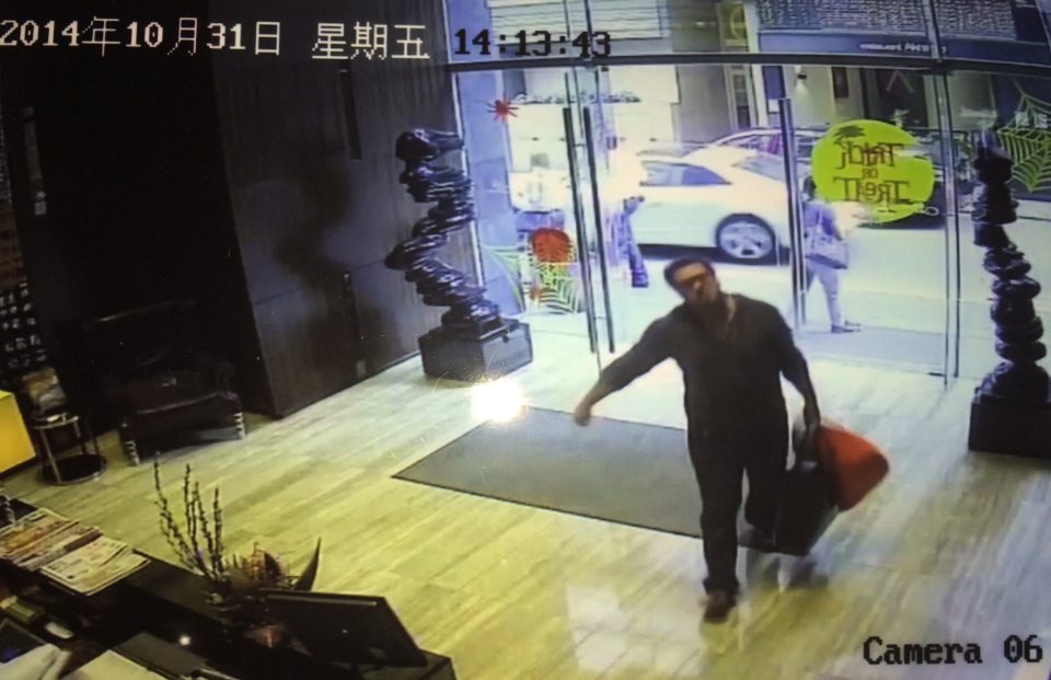  Security cameras show him arriving back carrying to heavy bags