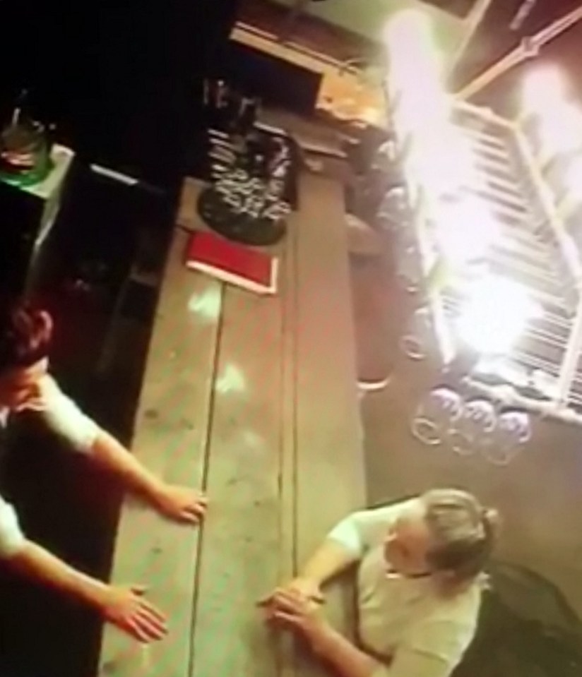  CCTV shows two staff chatting at the bar, well away from the tray full of glasses