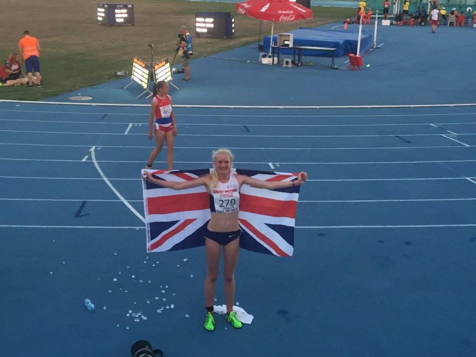  GB athlete Lucy drapes herself in Union flag at a recent competition