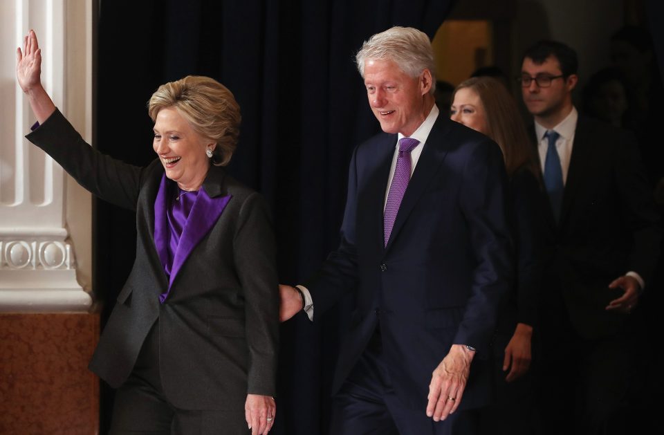  Clinton and her husband Bill came out smiling before she gave an optimistic speech about the American values