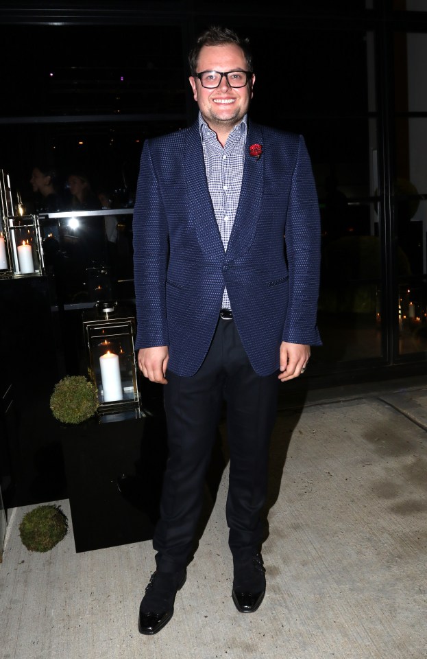  Alan was pictured sporting his usual look at a star-studded bash on November 23